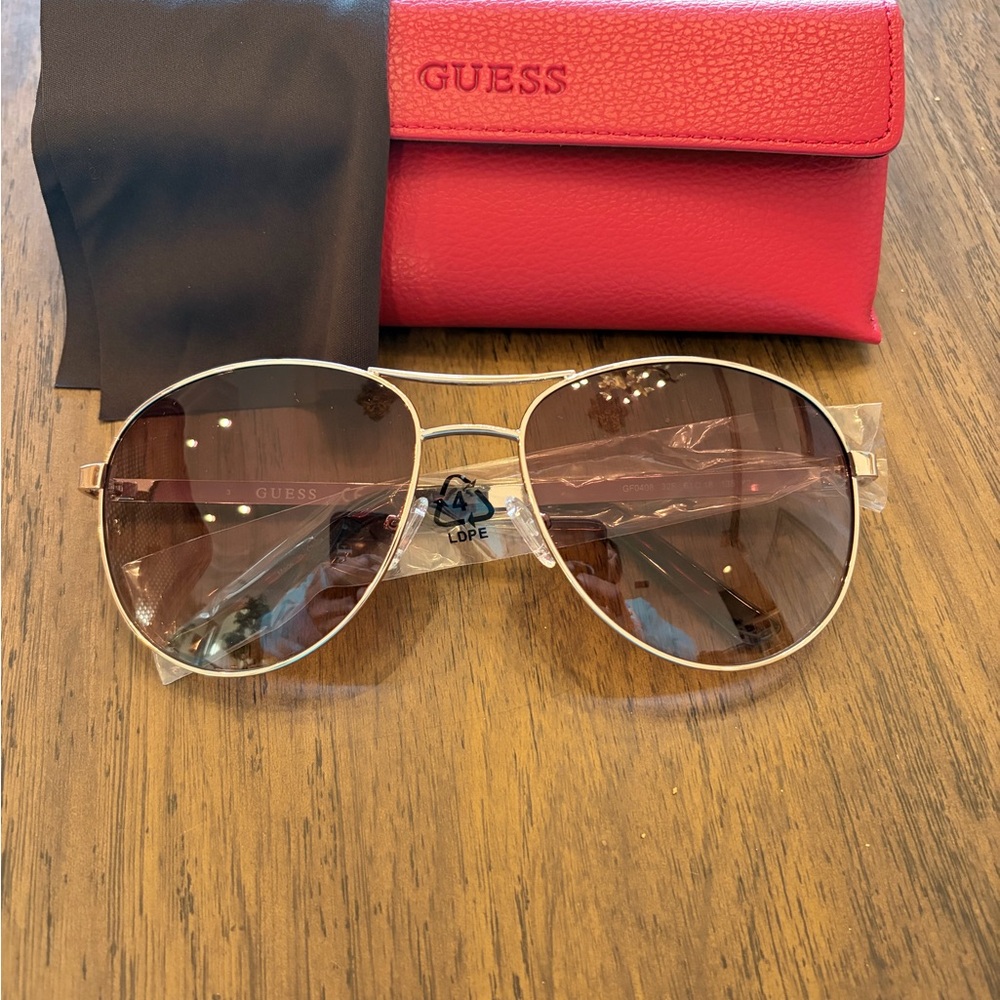 GUESS Women's Sunglasses - Gold Frame with Brown Lenses